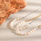 Two pearl-front necklaces arranged on fabric
