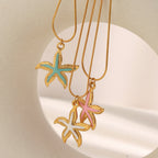 Enamel starfish pendant necklaces styled in pink aqua and ivory