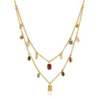 Gold tone double-layer necklace on white