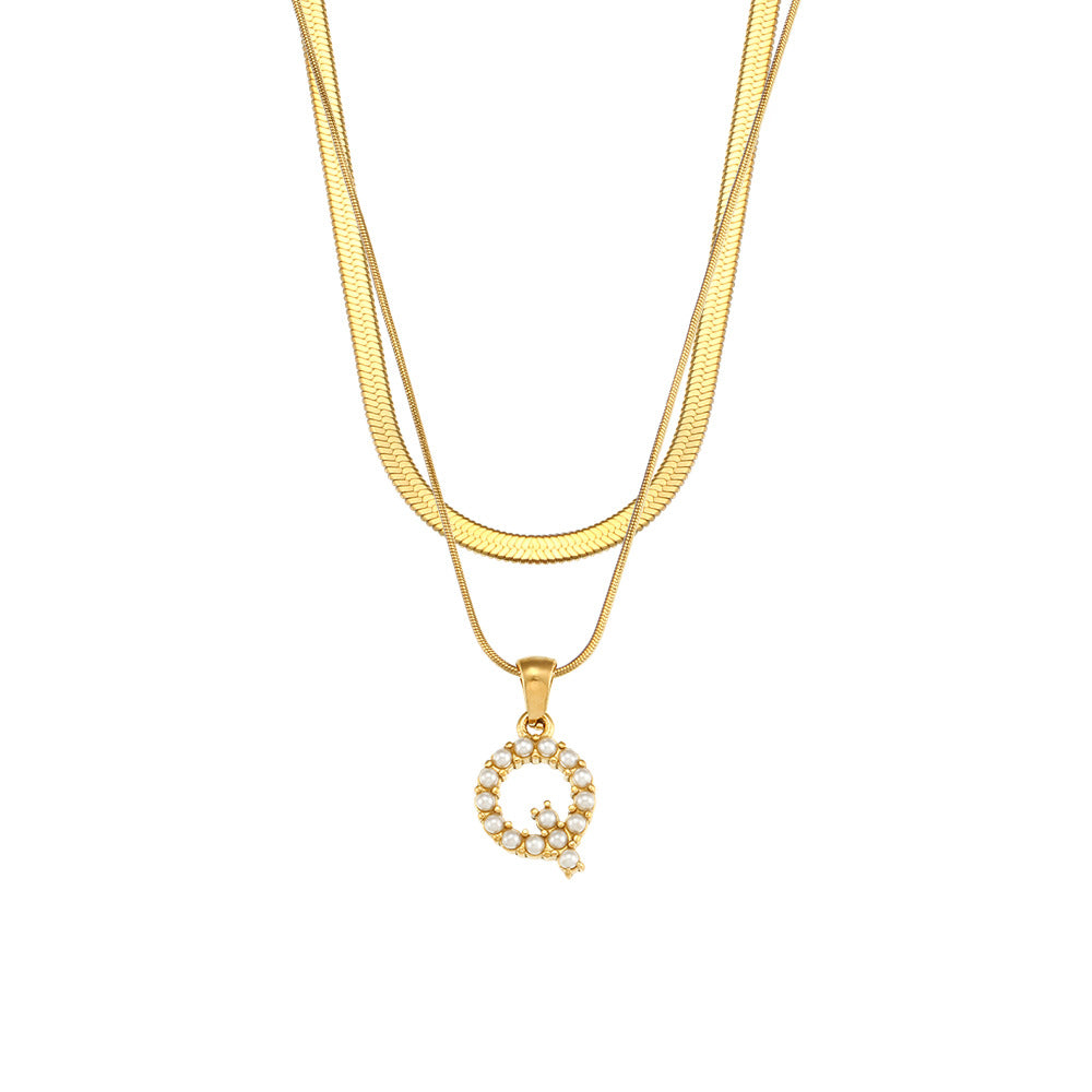 Gold-tone layered necklace with imitation pearl letter Q