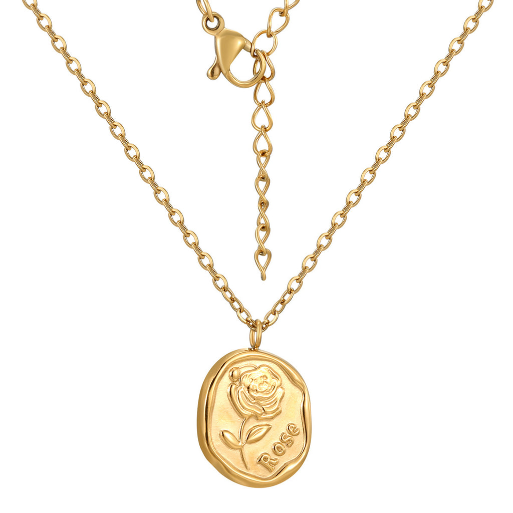 front detail of the embossed rose and word motif on the pendant