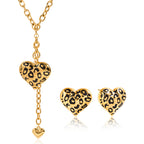 Leopard-pattern Y necklace shown with separate heart earring references