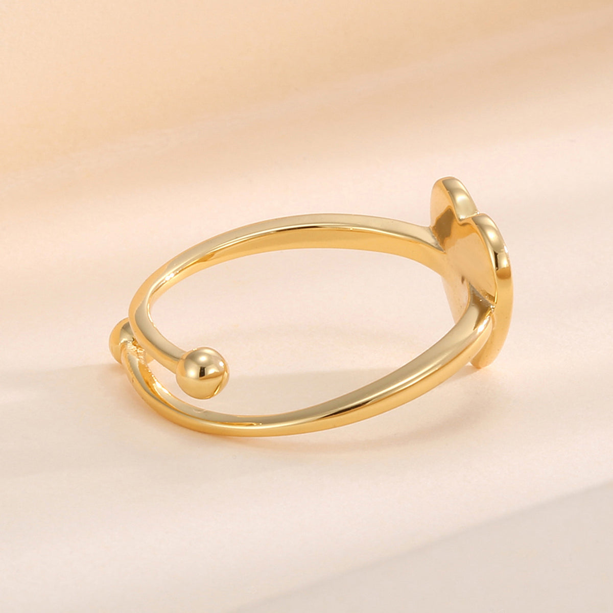 side profile showing the polished ball tip and heart plate