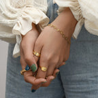 gold plated open heart bracelet styled on the wrist