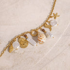 Gold-Tone Stainless Steel Ocean Charm Necklace — front view