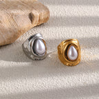 Gold and silver tone hammered rings with white white pearlescent centers