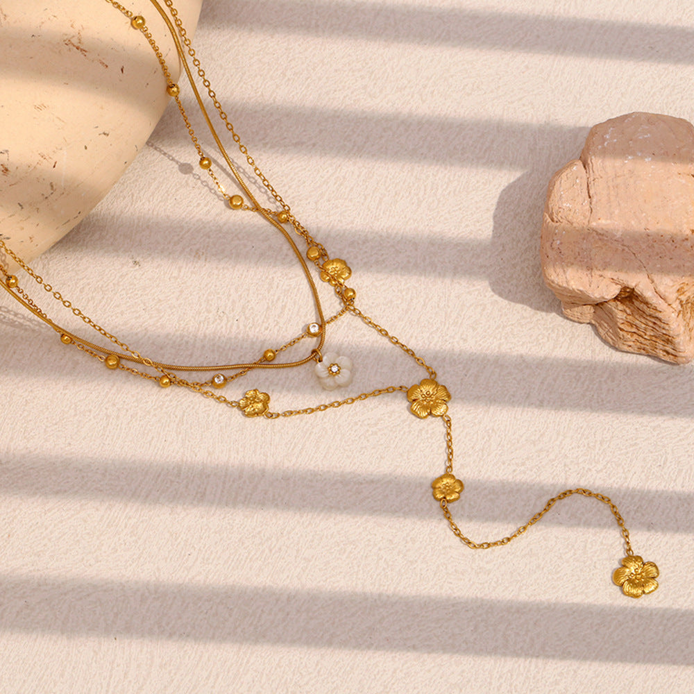 gold plated triple-layer floral lariat necklace