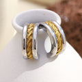 two-tone stainless steel C-hoops with a braided gold center