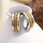 two-tone stainless steel C-hoops with a braided gold center