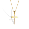 isolated gold plated cross pendant with clear stone channel