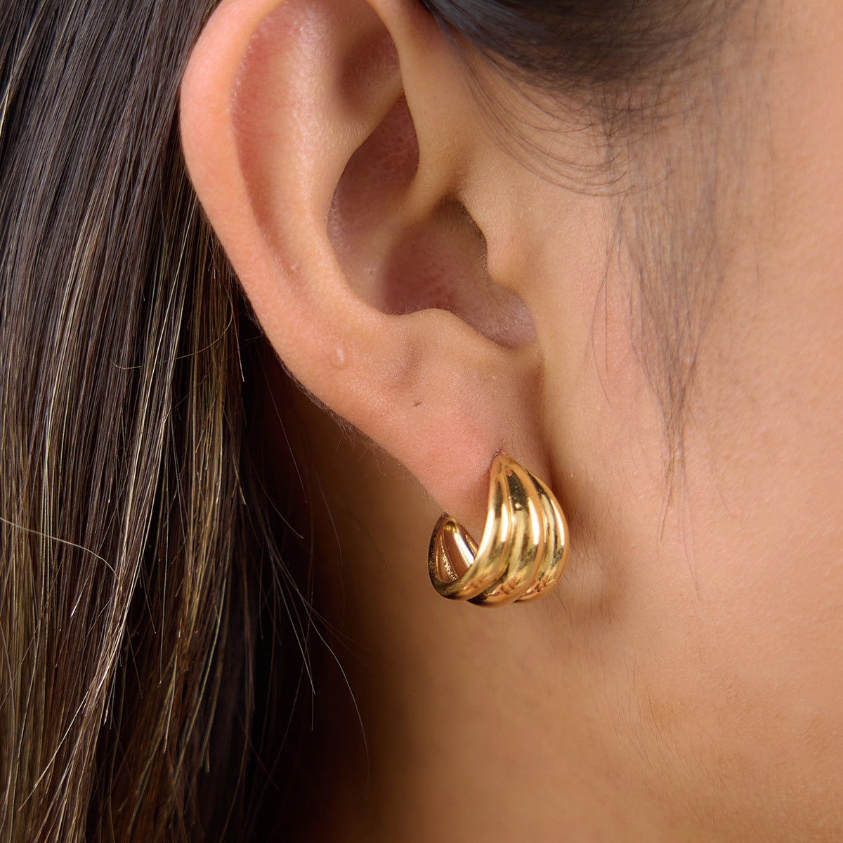 Side view of compact ridged open hoop