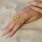 Gold-Tone Stainless Steel Sculptural Flower Ring Collection — styled view