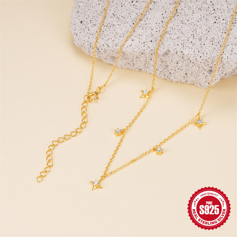 925 silver star station necklace laid flat with clasp visible