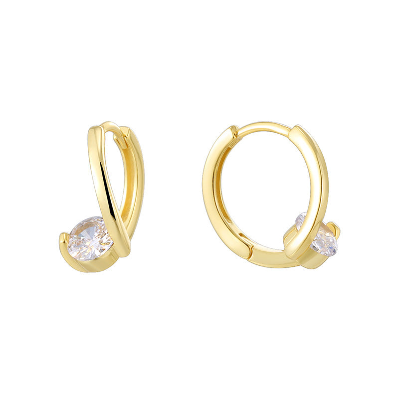 Gold Plated 925 Sterling Silver Round Zirconia Twist Hoop Earrings — pair on white with twisted fronts