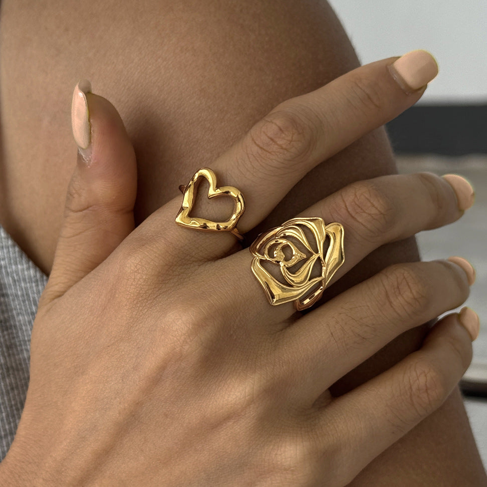 Open heart and rose rings worn together