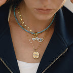 Gold-Tone Evil Eye Stainless Steel Necklace and Earring Collection styled product view