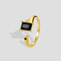 gold plated brass open ring with rectangular black stone and round accent