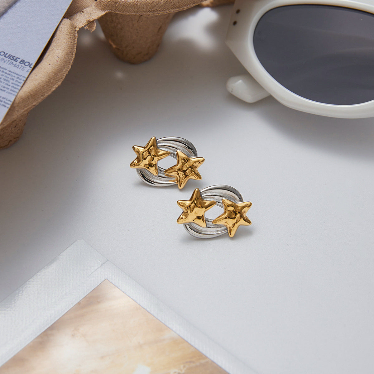 Two-Tone Star Stainless Steel Earring Collection – flat-lay view