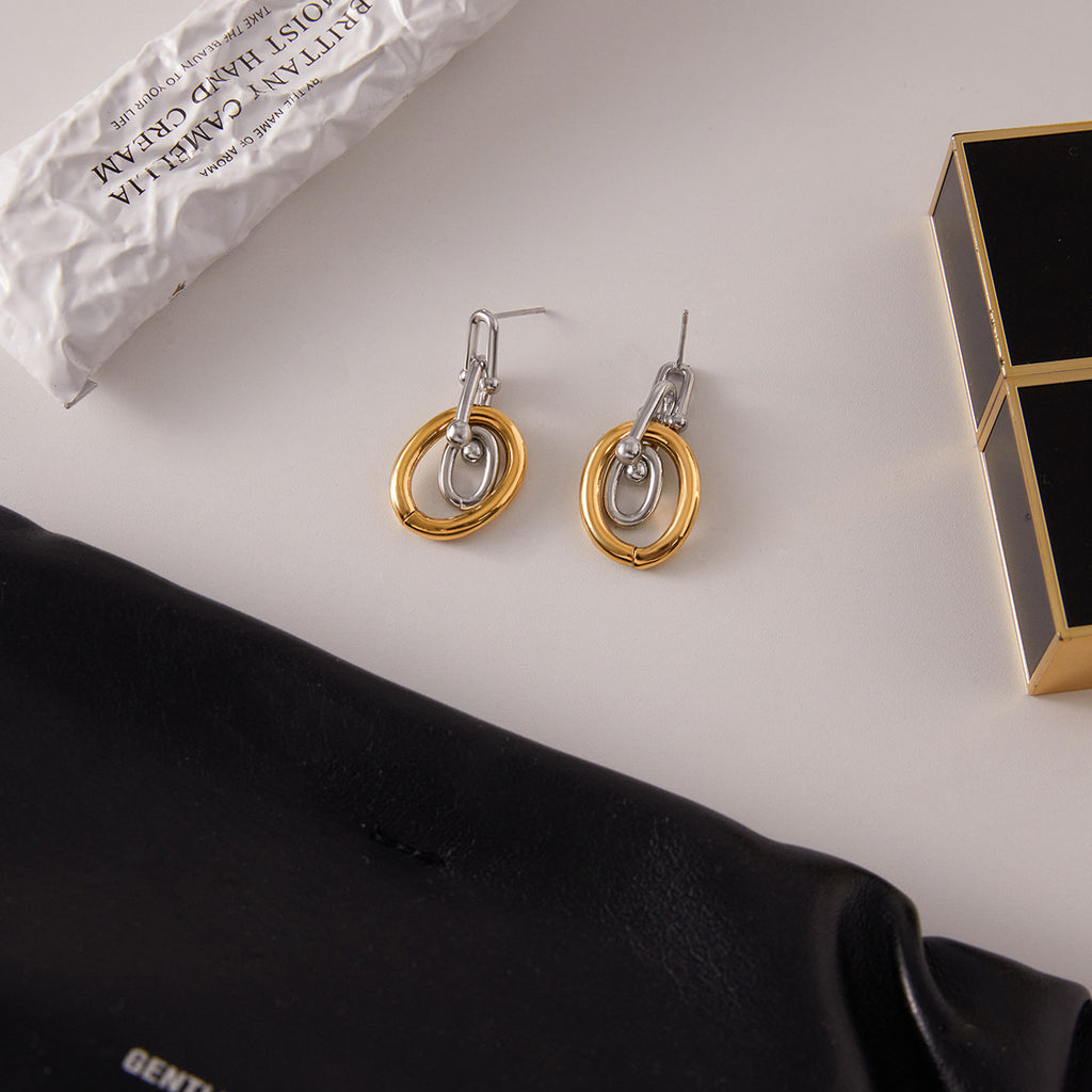 Two-Tone Interlocking Stainless Steel Drop Earrings close-up product view
