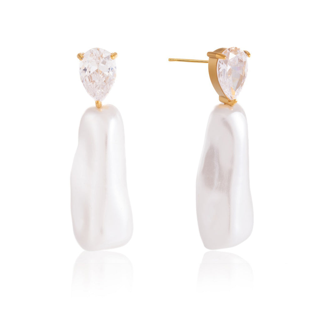Clear teardrop stone above elongated white drops