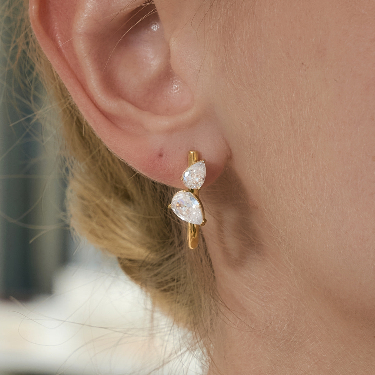 Mixed-cut zirconia hoop worn close-up