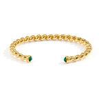 Front view of twisted stainless steel cuff with green stone terminals