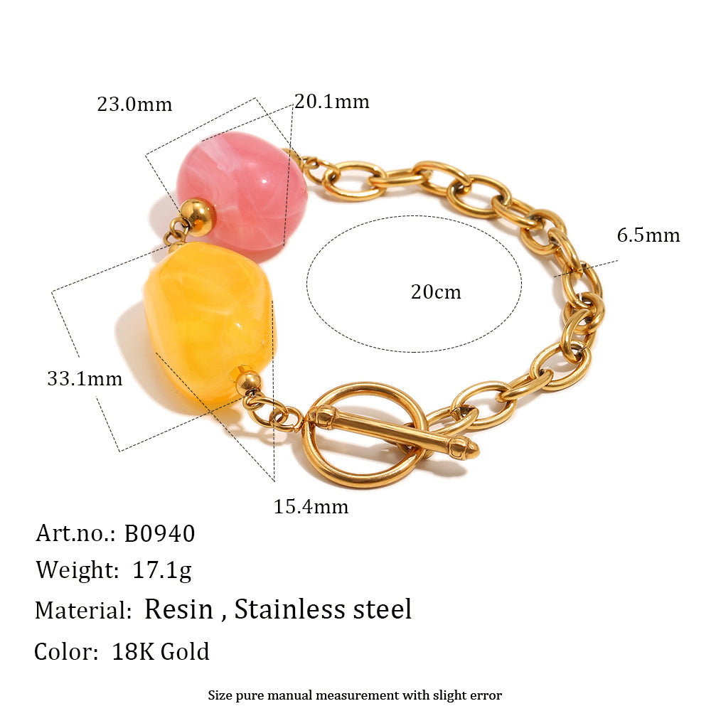 Yellow and pale pink bead bracelet showing 20 cm length