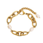 isolated oval-link bracelet with white pearl accents and extender