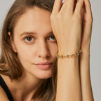 delicate gold plated bow-knot link chain bracelet worn on the wrist