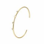 isolated open cuff with zirconia and white round cabochon
