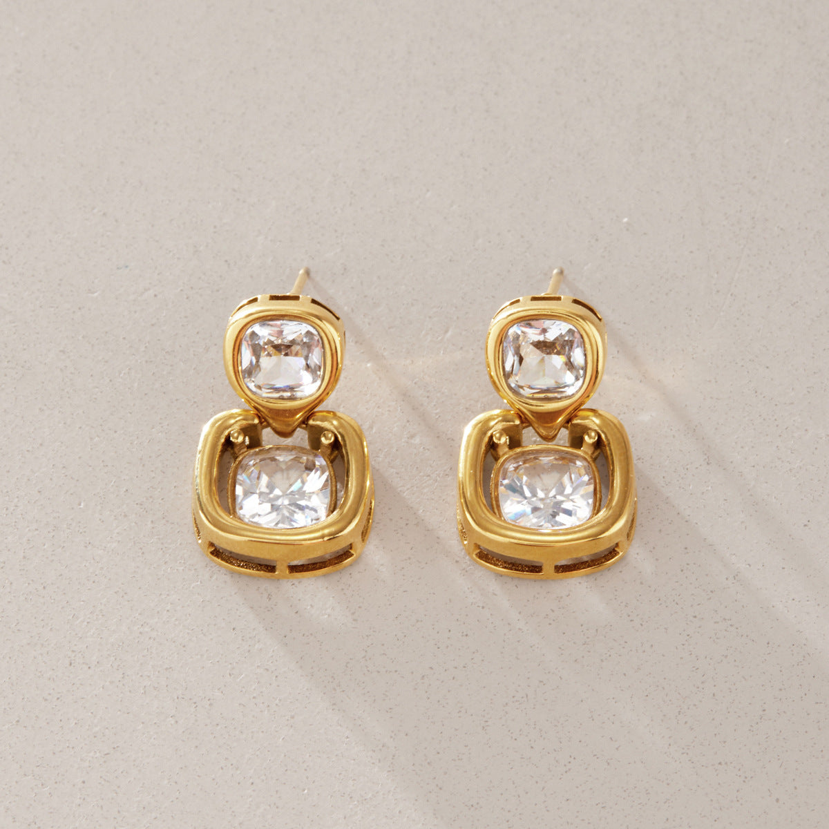 Front and back of rounded-square drop earrings