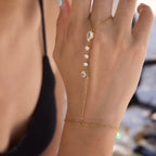 Close-up of clear stones along a hand chain