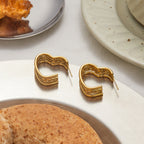 Wholesale Gold-Tone Stainless Steel Hoop and Teardrop Stud Earring Collection - side profile