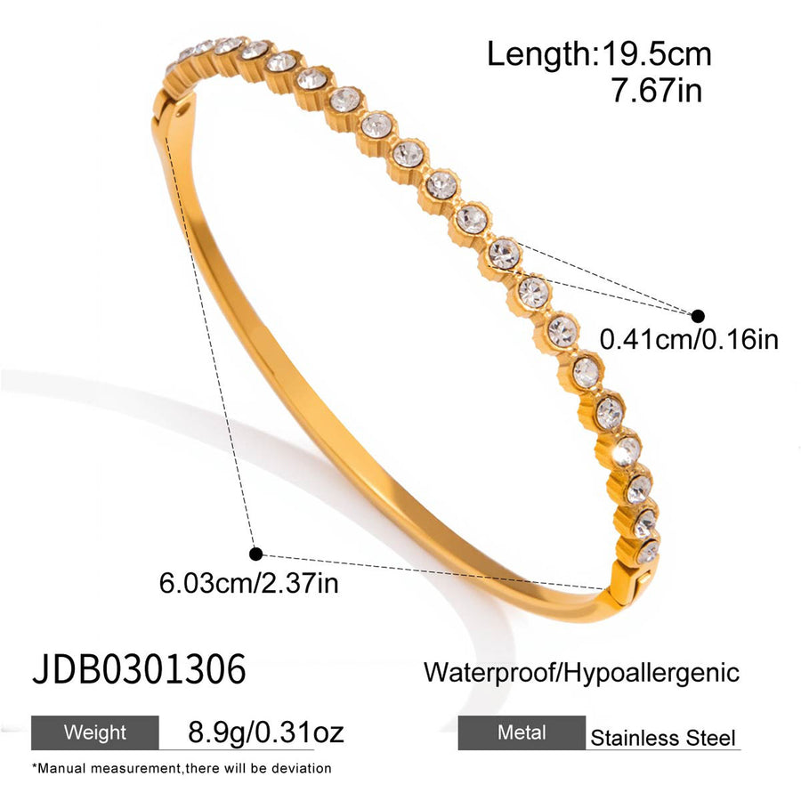 Graduated round clear accent gold-tone stainless steel bangle