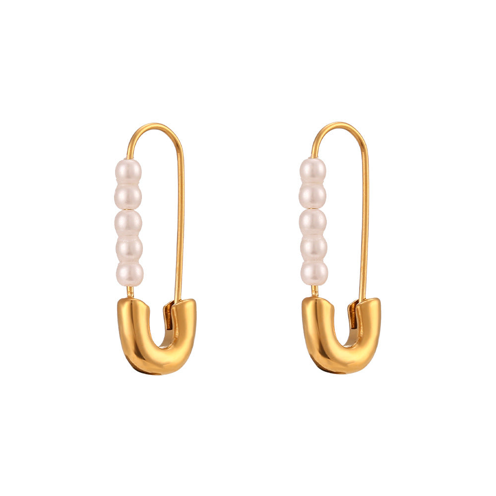 Stainless steel imitation pearl pin earrings isolated on white