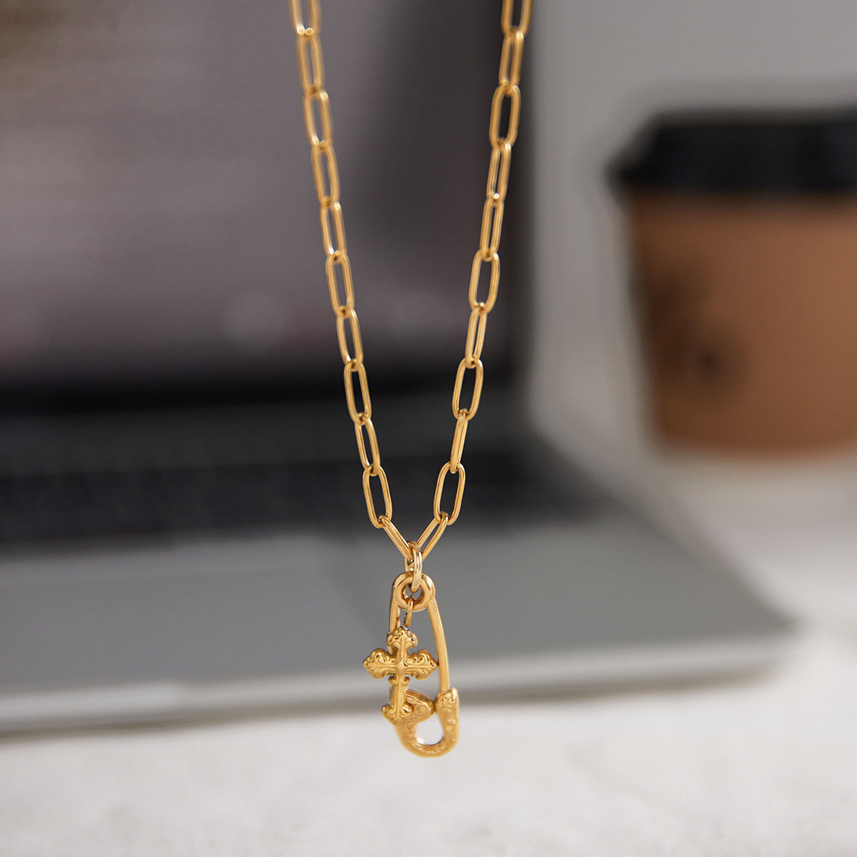 paperclip chain necklace with safety pin and cross charms