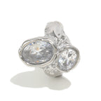 silver-finish statement ring with oval and round clear stones
