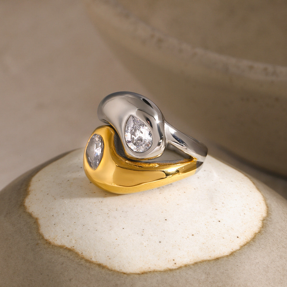 Two-Tone Stainless Steel Sculptural Ring Collection — detail view