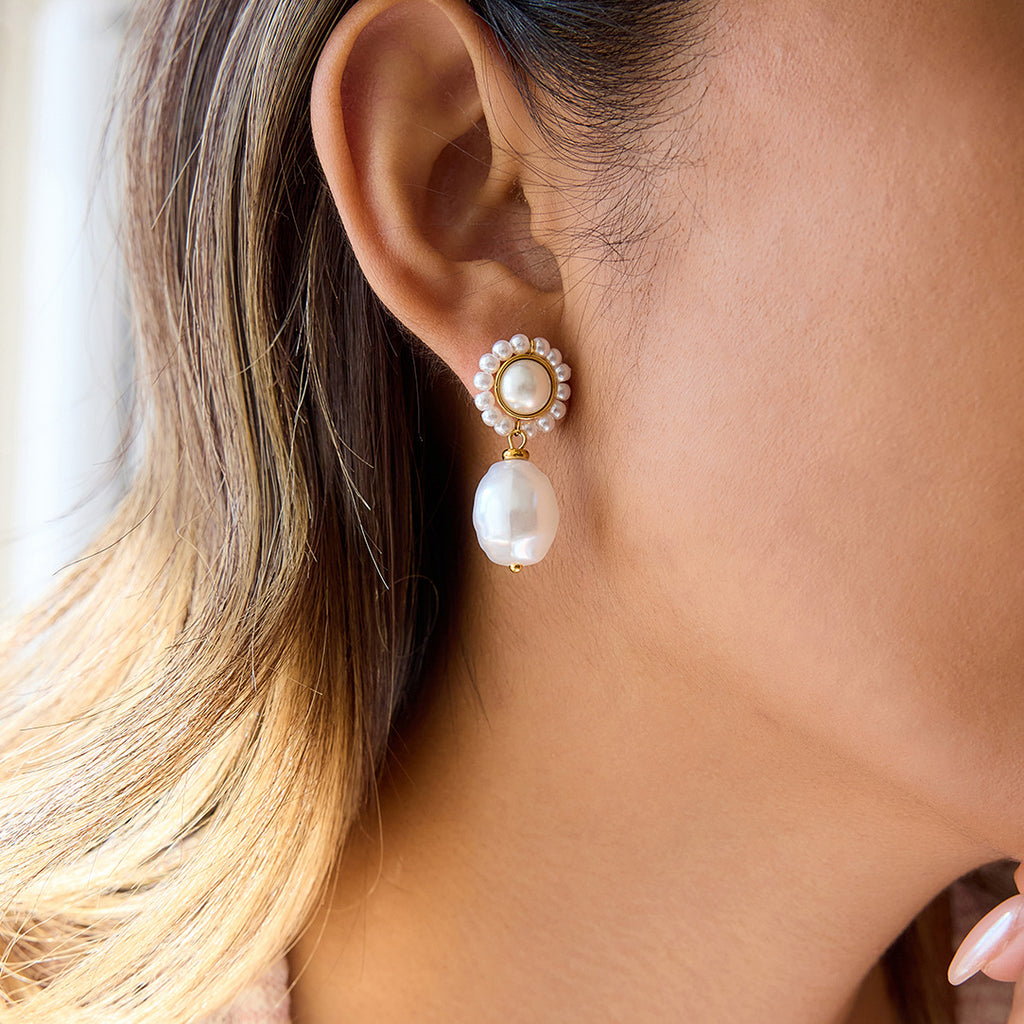 Gold-Tone Pearl-Look Stainless Steel Drop Earrings shown on model