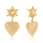 Front view of gold-tone heart drop earrings with white bead