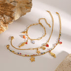 Gold Plated Stainless Steel Ocean Charm Bracelet Collection — styled view