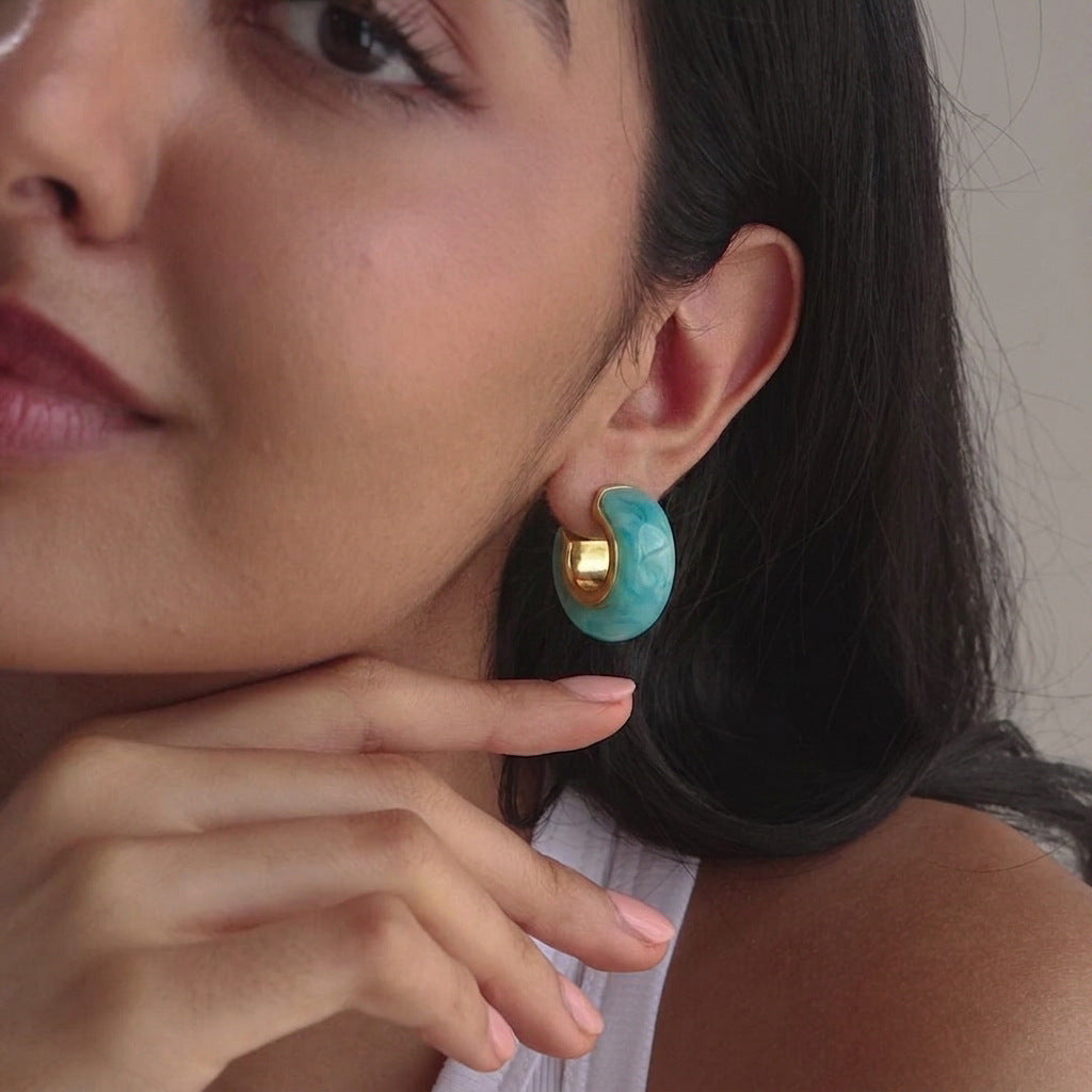 Blue resin chunky hoop shown in a model styling view