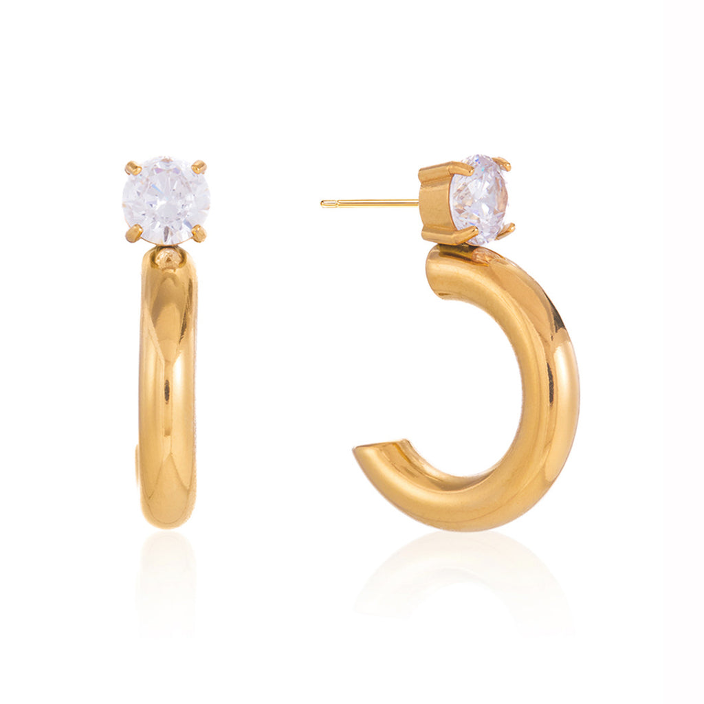 isolated stainless steel C-hoop earrings with round clear stones