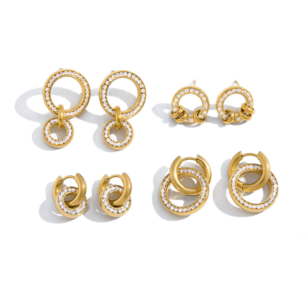 Circle-link earring assortment on white