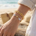 Shell cuff and two-tone marine bracelet worn together