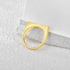 underside view of rectangular signet ring with squared shoulders