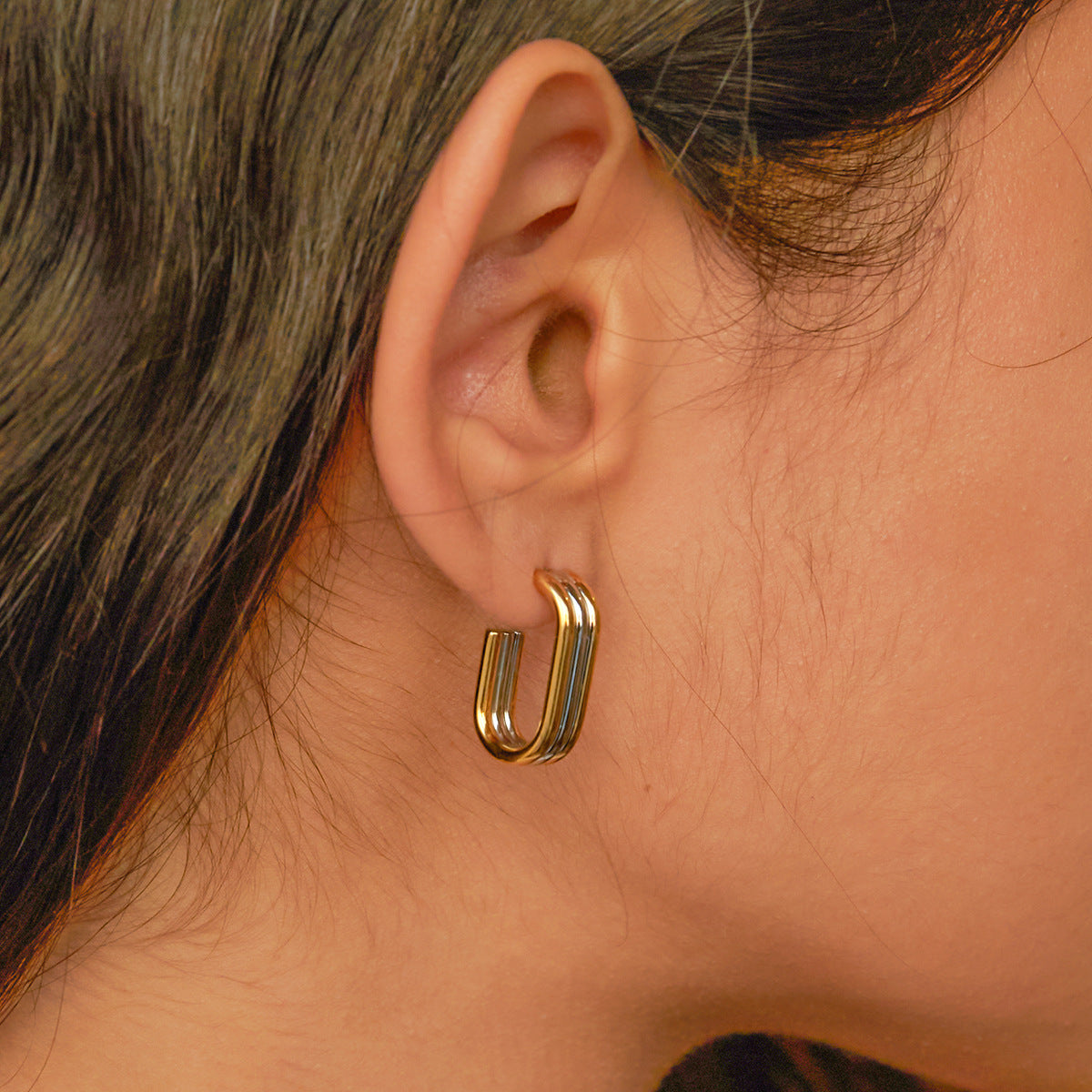 Two-Tone Triple-Line Stainless Steel Stud Earrings on-model view