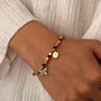 model wearing the gold plated pink butterfly bead bracelet