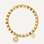 gold plated starfish medallion bracelet with amber-color beads