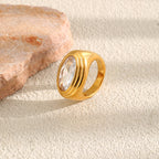 gold plated 316L stainless steel ring with oval clear stone